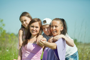 Two happy women with teens